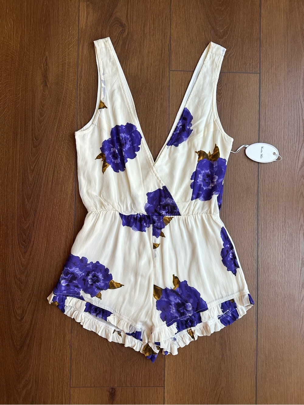 Romantic Winston White Sleeveless Cream Romper with Purple Floral Print